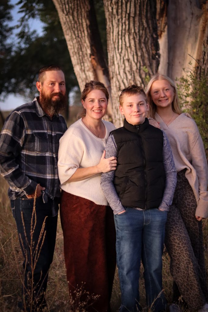 A photo of business owner Raena and her family 